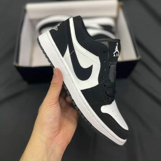 JORDAN RETRO 1 LOW BLANCO - NEGRO
