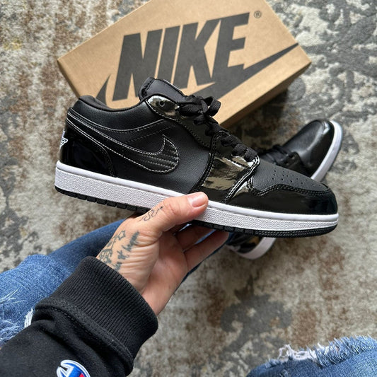 RETRO 1 LOW CHAROL NEGRA - BLANCA