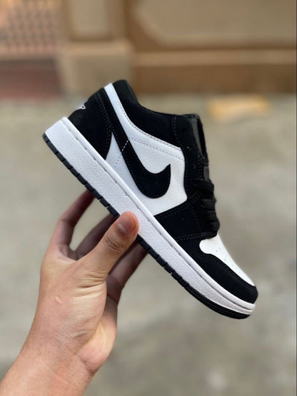 JORDAN RETRO 1 LOW BLANCO - NEGRO