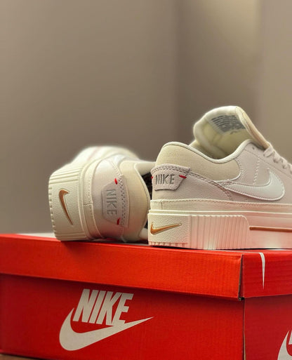 NIKE LEGACY BEIGE