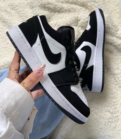 JORDAN RETRO 1 LOW BLANCO - NEGRO