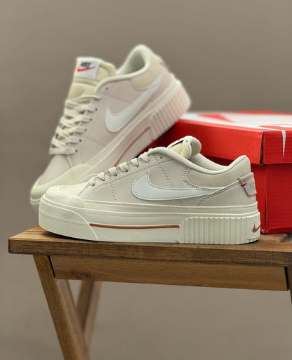 NIKE LEGACY BEIGE