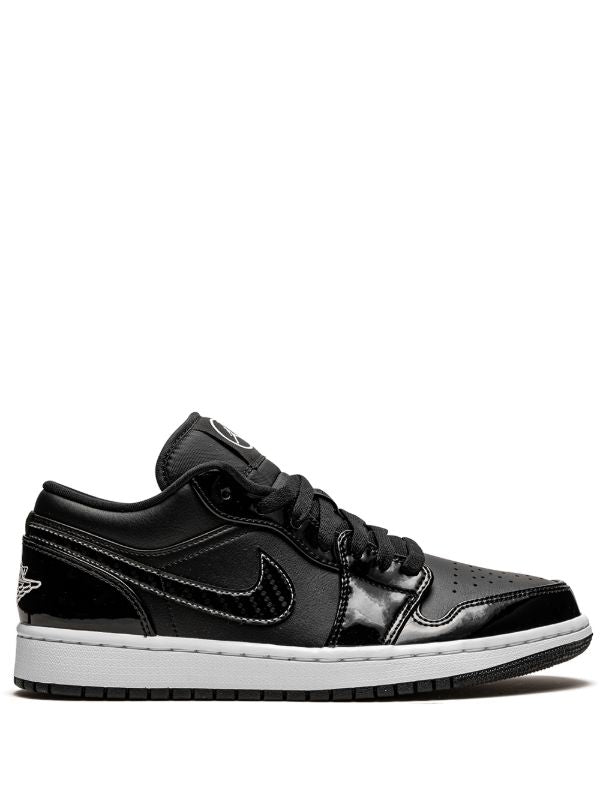 JORDAN RETRO 1 LOW CHAROL NEGRO / BLANCO