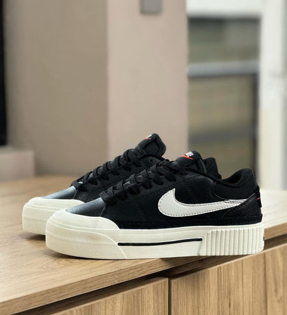 NIKE LEGACY NEGRO - BLANCO
