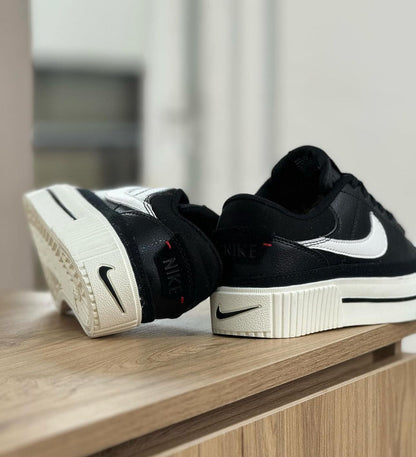NIKE LEGACY NEGRO - BLANCO